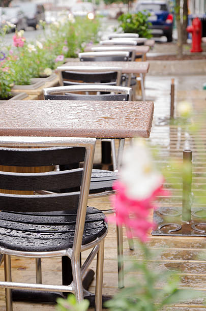 istock Wet table on an outside restaurant patio after rain 541846790