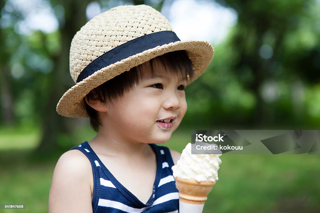 Boy you have a soft-serve ice cream in the park Asia Stock Photo