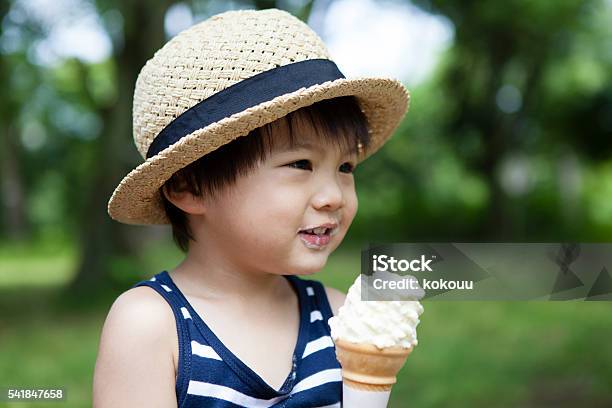 Boy You Have A Softserve Ice Cream In The Park Stock Photo - Download Image Now - Asia, Blue, Boys