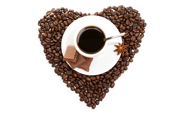 istock white cup of coffee on  beans as a heart 541850782