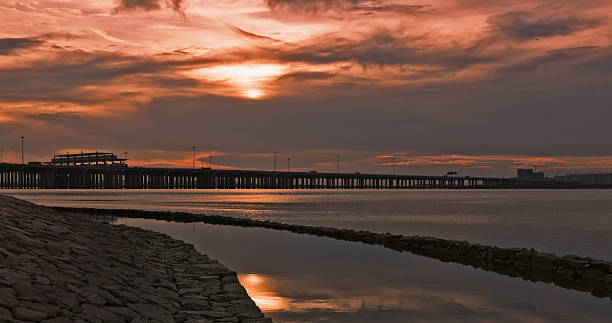 istock sunset by the sea 541854168
