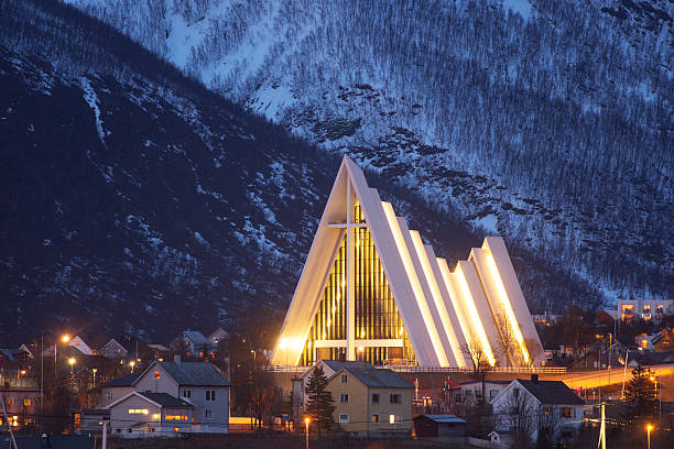 The arctic cathedral in Tromso. The famous and modern arctic cathedral in Tromso - a landmark of the city. tromso stock pictures, royalty-free photos & images