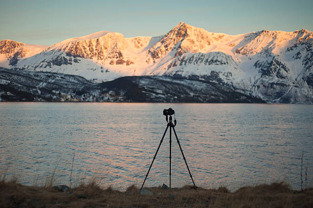istock Camera and tripod in the Norwegian fjords 541855396