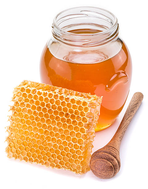 istock Jar full of fresh honey and honeycombs. 541861910