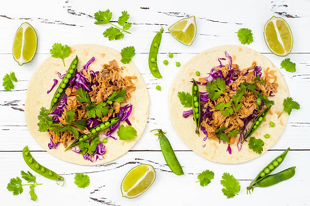 Mexican tacos with meat, peas and purple cabbage Mexican tacos with meat, peas and purple cabbage delaware chicken stock pictures, royalty-free photos & images