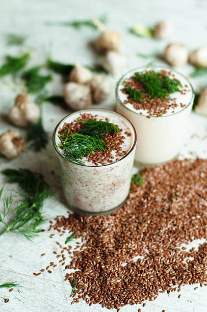 istock Glass of yogurt with crushed flax seeds 541862700
