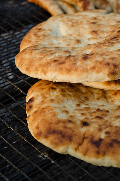 istock Hot homemade Flatbread on a grill for barbecue 541863204