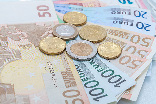 istock Money euro coins and banknotes 541864010