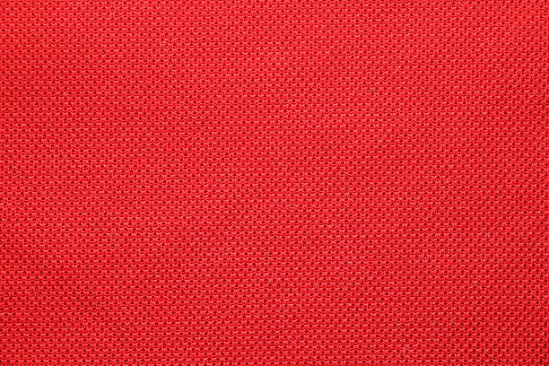 fond texturé rouge tissu de sport - jersey en matière textile photos et images de collection