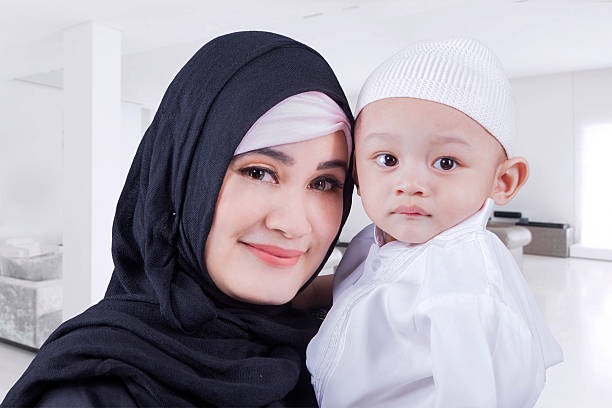 istock Arabic woman and her son at home 541867038