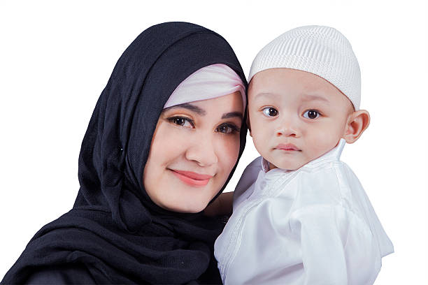 istock Arabic woman with her son in studio 541867094