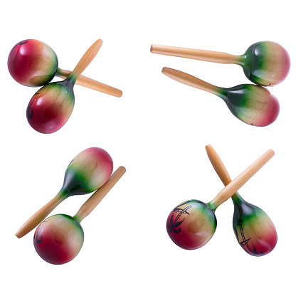 Percussion musical instrument a maracas on the isolated background