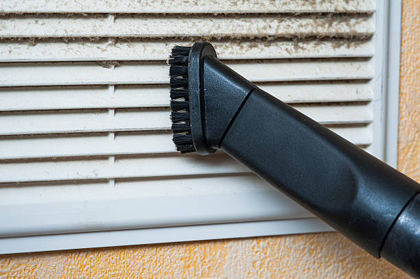 Closeup of vacuum cleaner pipe and ventilation grill Closeup of vacuum cleaner pipe and ventilation grill dusting stock pictures, royalty-free photos & images