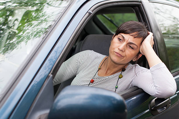 istock woman in traffic congestion 541869588