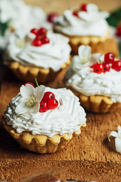 istock Beautiful chocolate cupcakes with white protein cream 541870188