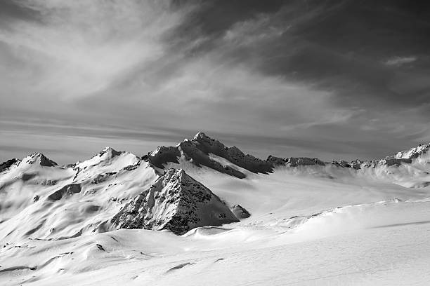 istock Black and white view on off-piste slope at sun evening 541969248