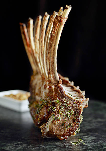 delicious ribs delicious ribs forming a graphic serving rack of lamb stock pictures, royalty-free photos & images