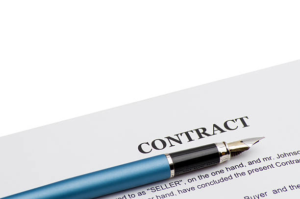 istock Close-up of pen on contract 541969458