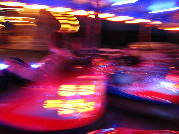 istock blurred background bright lights colors dodgem bumper cars intoxication 541969840