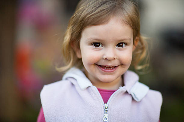 istock Cute smiling baby girl 541970070