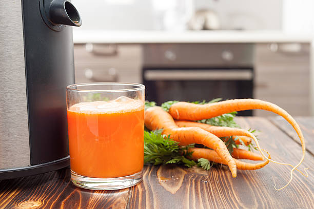 istock fresh carrot juice from young carrots 541970134
