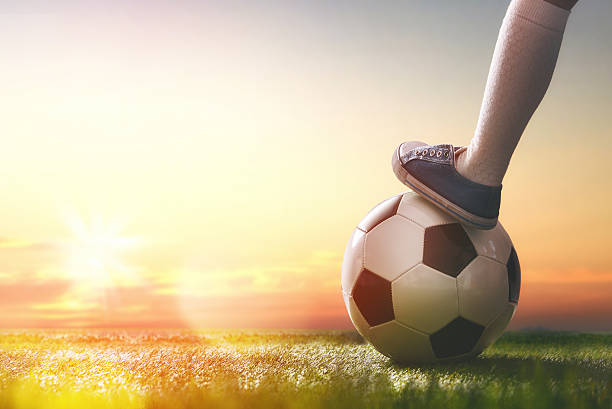 istock Child plays football. 541970490