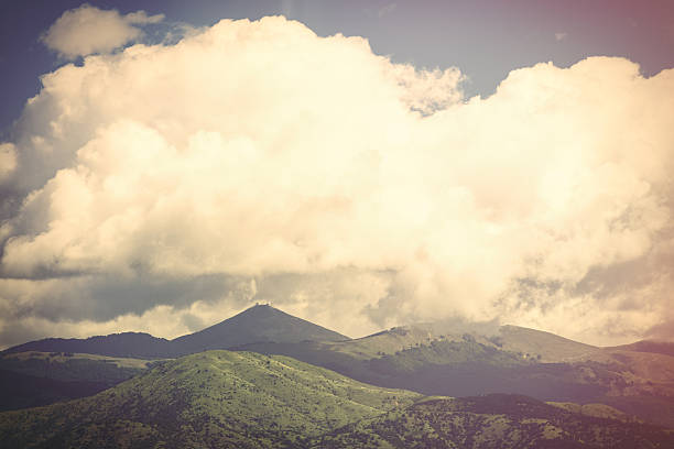photo of the beautiful mountains on the sky background