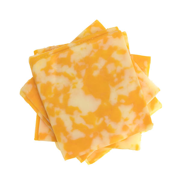 fette di formaggio colby-jack su sfondo bianco - formaggio monterey jack foto e immagini stock