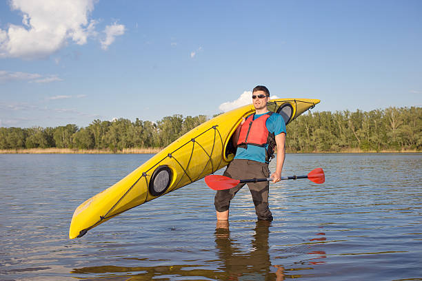 istock Man traveling on the river in a kayak 541972148