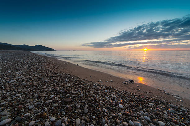 istock Beautiful early sunrise on the ocean. 541974624