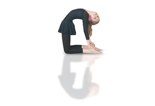 istock dhanurasana yoga 541975260