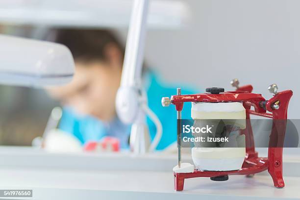 Prosthodontic Lab Focus On Dentures Stock Photo - Download Image Now - Adult, Busy, Close-up