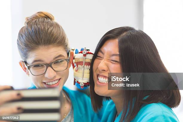 Playful Prosthetic Dentistry Students Taking Selfie Stock Photo - Download Image Now