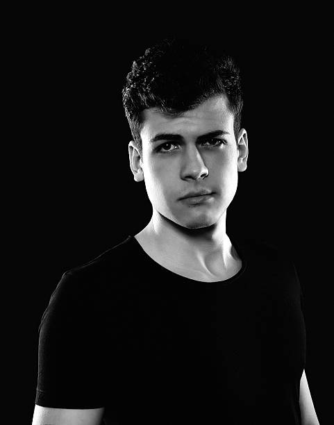 istock stylish young man studio portrait 541978946