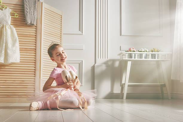 istock girl in a pink tutu 541982618