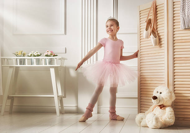 istock girl in a pink tutu 541983466