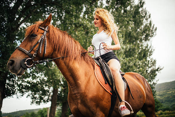 istock Woman on a horse 541985052