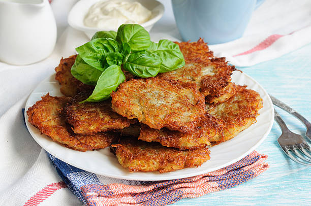 istock Fried potato pancakes with basil leaves 541986876