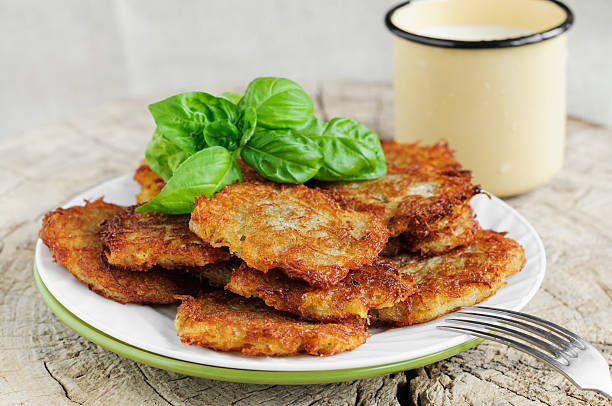 istock Fried potato pancakes decorated with basil leaves 541986942