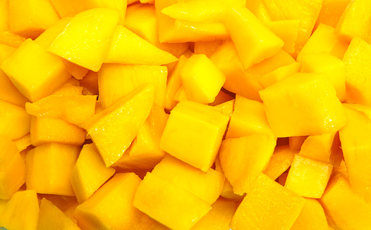 Mango diced on the skin closeup square composition