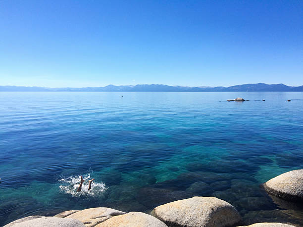 istock Man diving into Lake Tahoe in summer 541993130