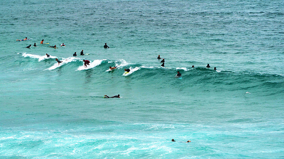 Surfers at Bondi beach in Australia.