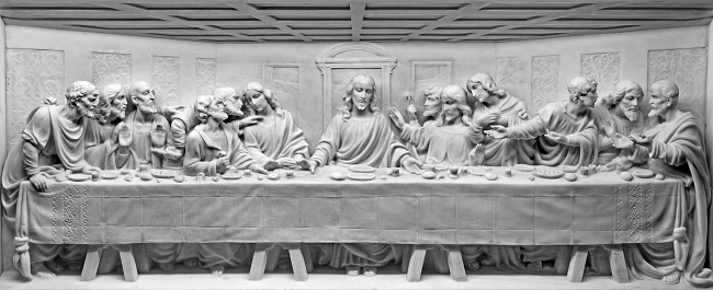 Rome, Italy - March 10, 2016: Rome - The Last Supper marble relief on the altar of church Basilica di Santa Maria Ausiliatrice by unknown artist.