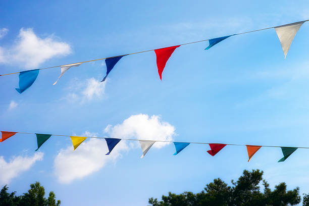 istock Colorful decoration flags against blue sky 541999668