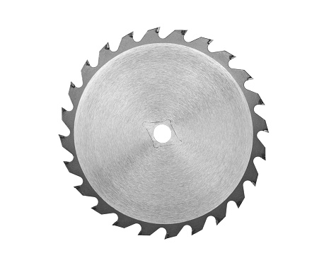 Circular saw blade close-up, isolated on white.