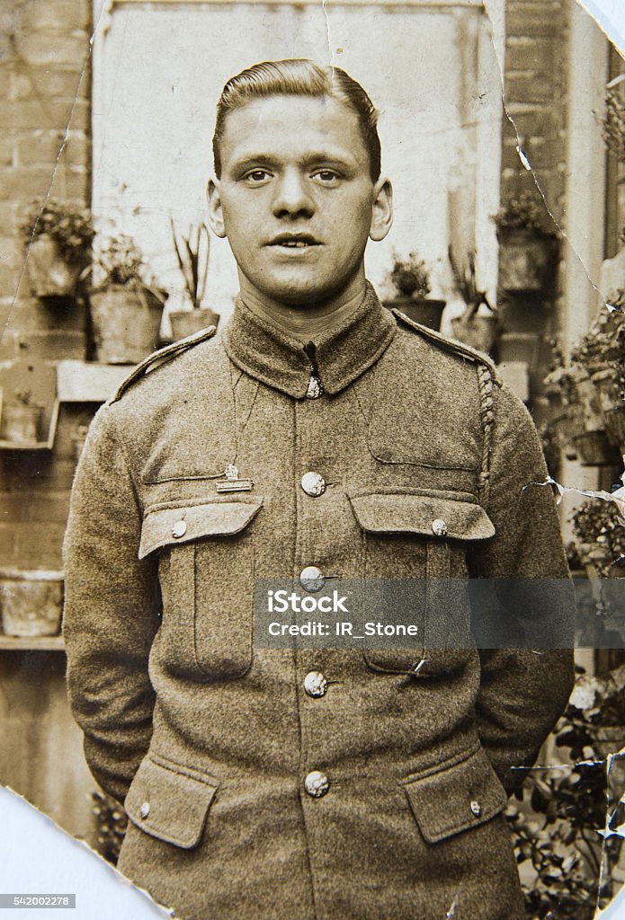 English soldier, portrait  of young man 1940th, vintage photo Old-fashioned Stock Photo