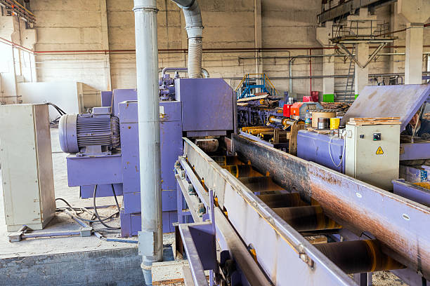 istock Sawmill. The process of cutting logs into boards 542003848