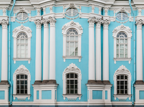 Several windows and columns in a row on facade of of St. Nicholas Naval Cathedral front view, St. Petersburg, Russia