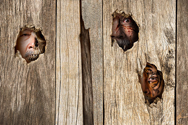 istock Human character in wooden hold 542010624