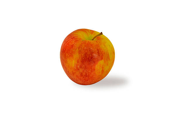 istock Golden apple with clipping path and white background 542011258